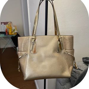 Micheal Kors Gold Glitter East West Tote bag.